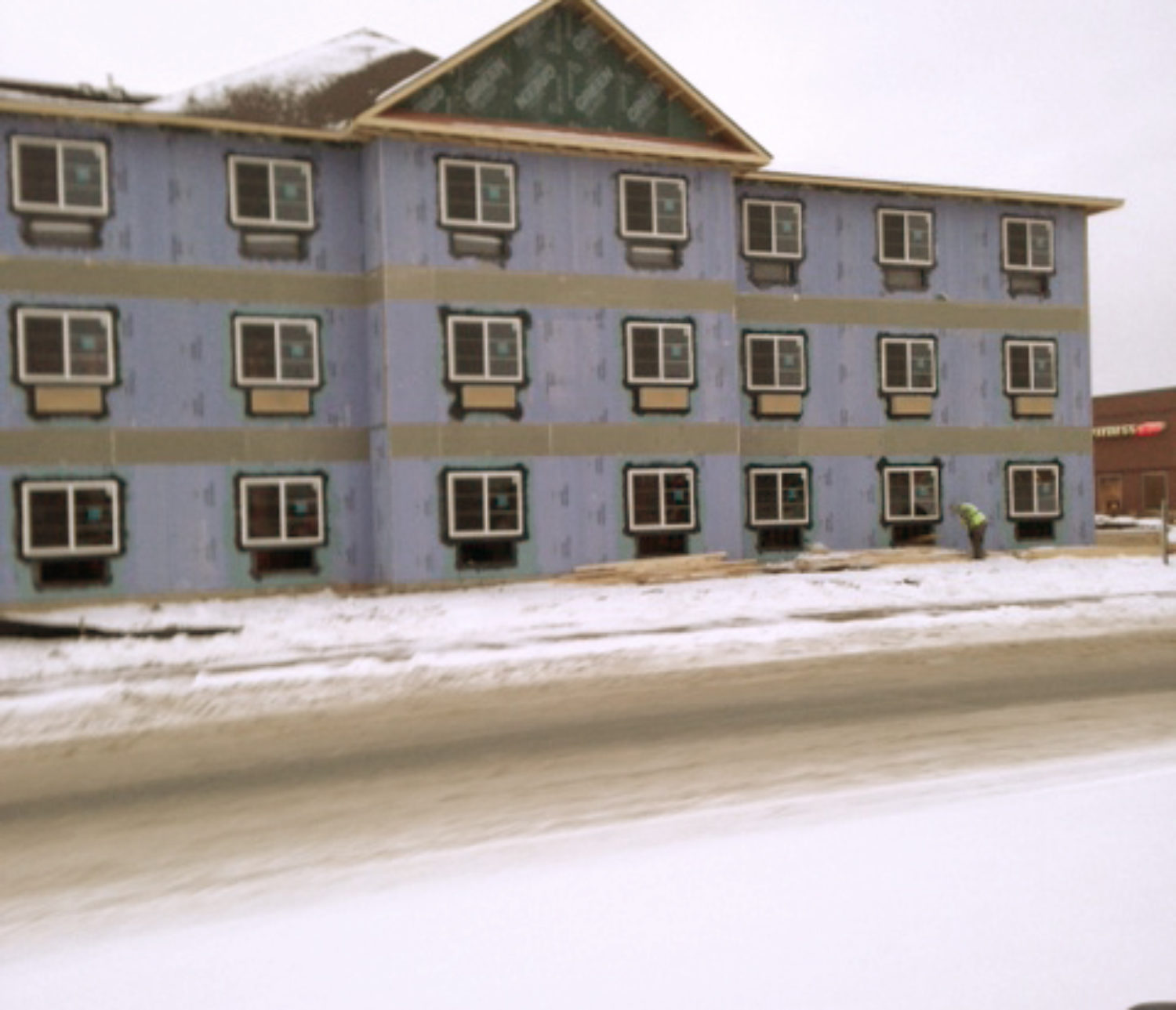 Truss setting by crane service fro 60'x100' pole barn