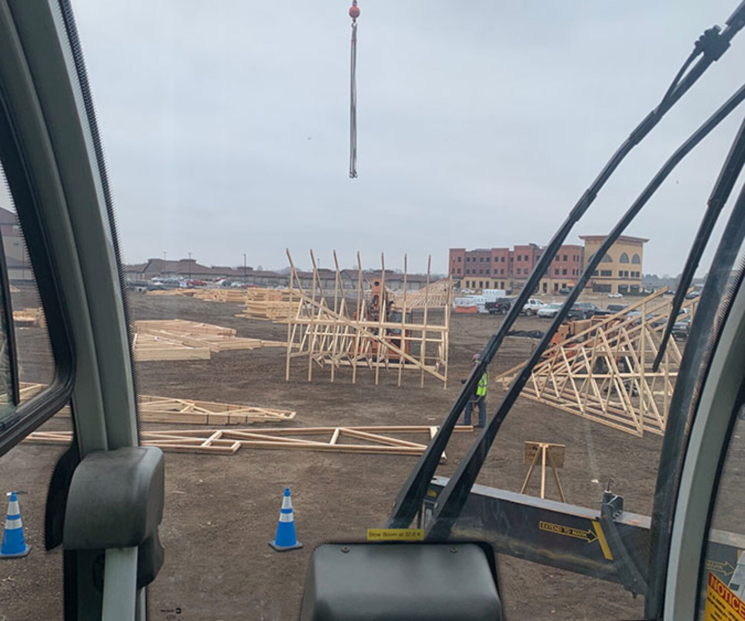 MCF Crane Service setting roof trusses