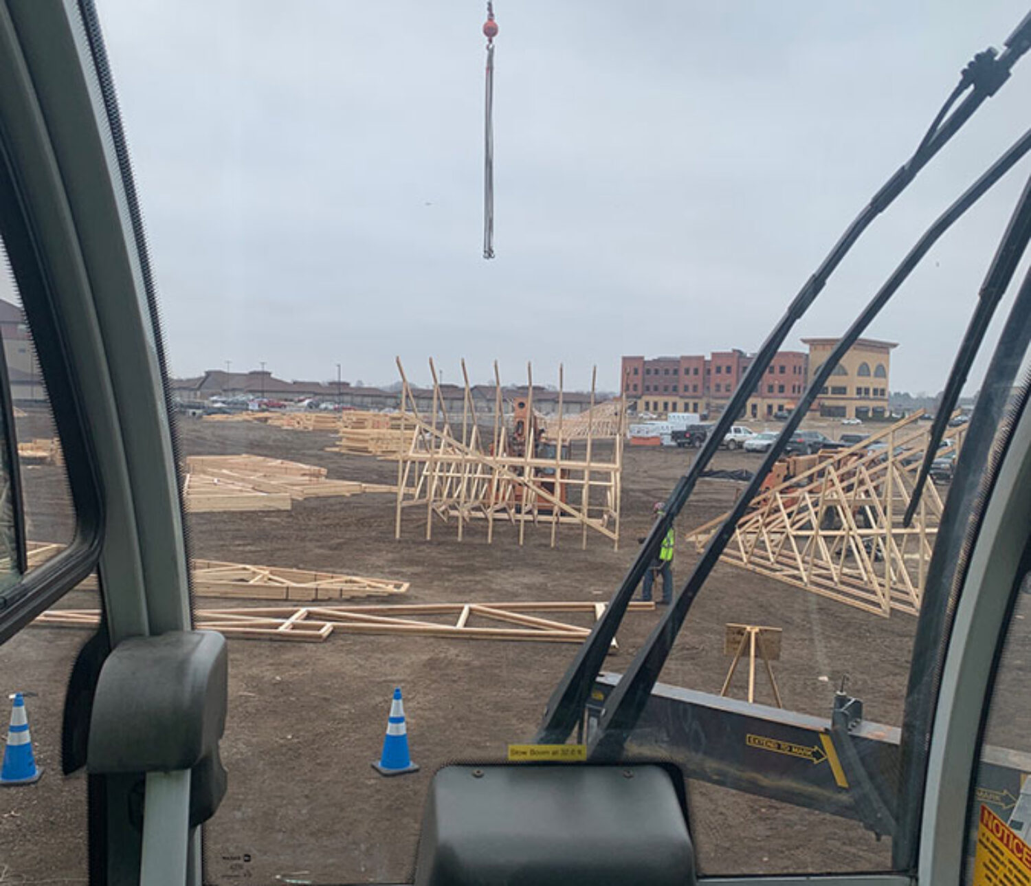 MCF Crane Service setting roof trusses