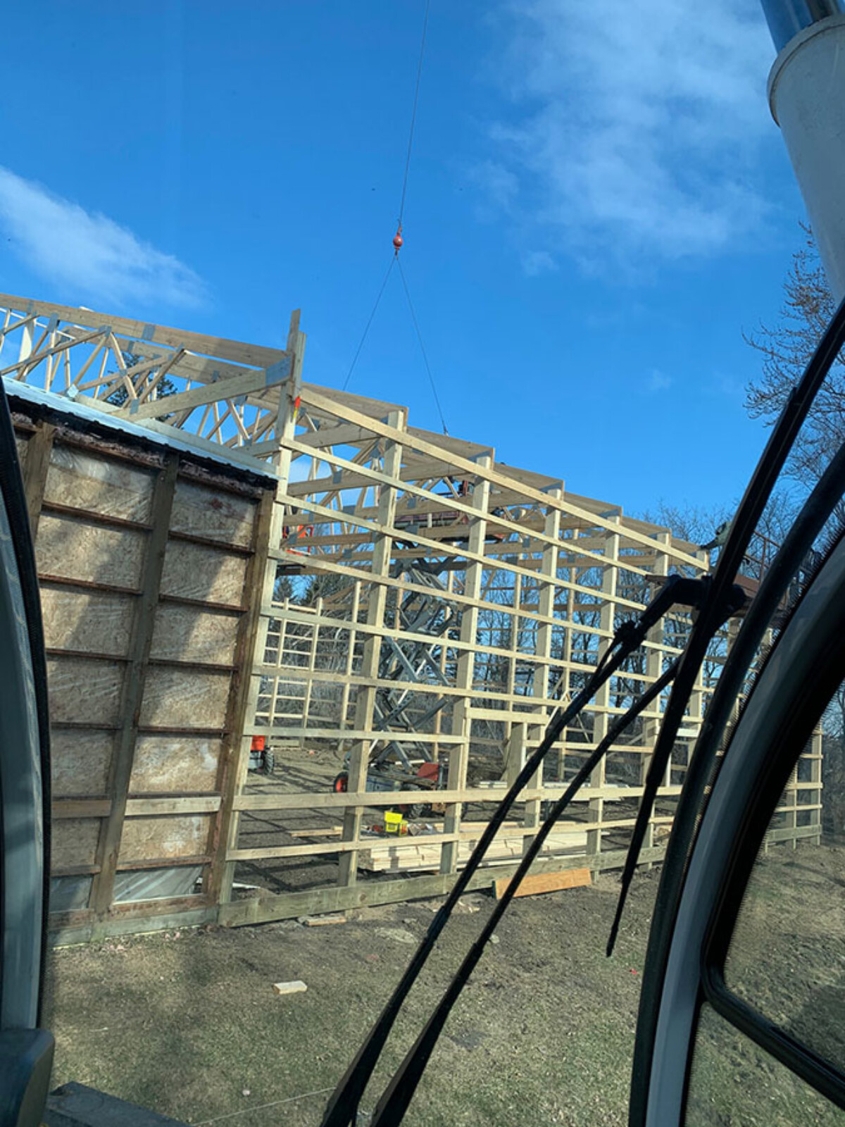 Crane Service: Setting Pole Barn Trusses