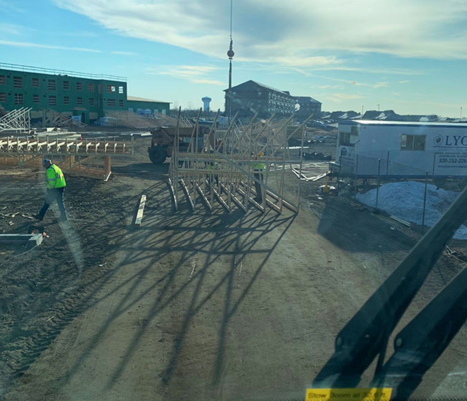 MCF Crane Service setting roof trusses