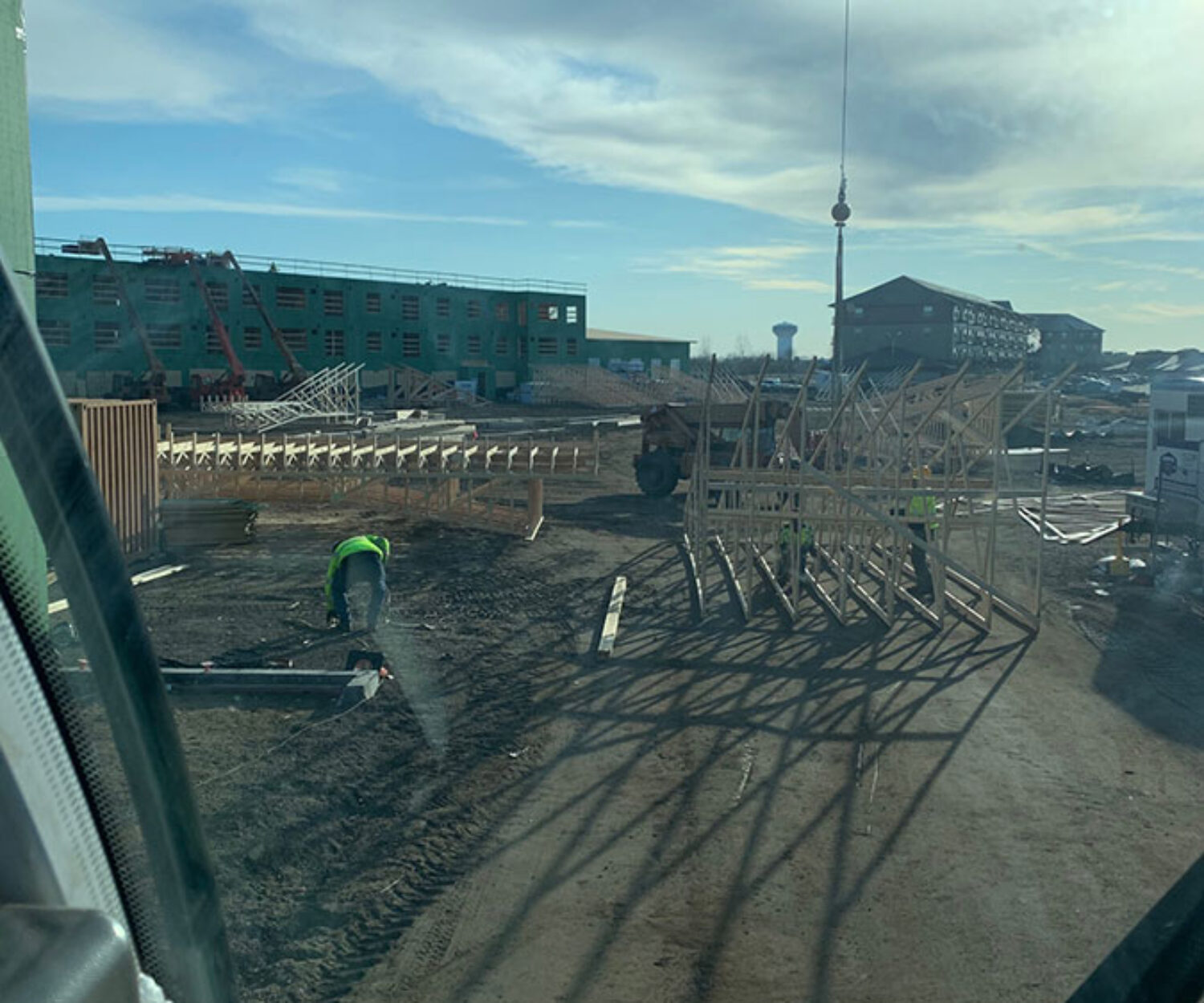 MCF Crane Service setting roof trusses